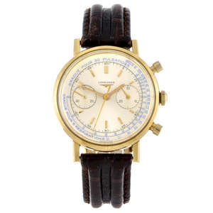 a gentleman's yellow metal Flyback chronograph wrist replica watch.